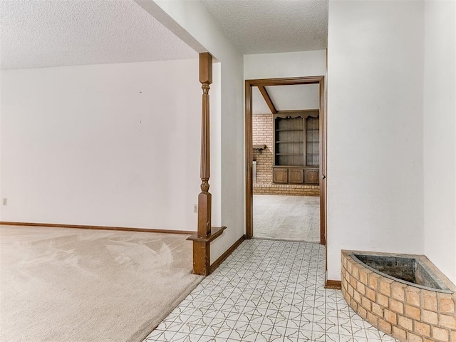 5201 SE 53rd St, Oklahoma City, OK 73135 - hall with light colored carpet, a textured ceiling, and baseboards