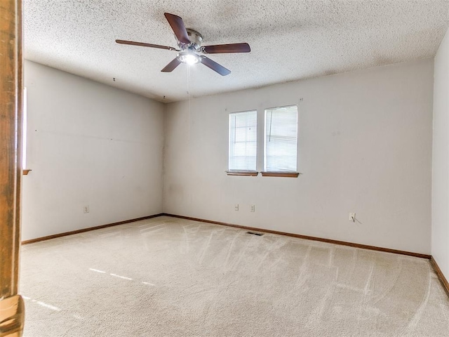 5201 SE 53rd St, Oklahoma City, OK 73135 - carpeted empty room with a ceiling fan, baseboards, and a textured ceiling