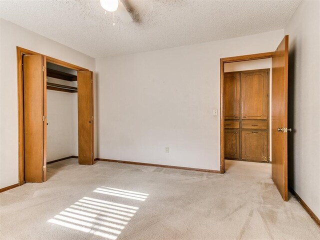 5201 SE 53rd St, Oklahoma City, OK 73135 - unfurnished bedroom featuring light colored carpet, a textured ceiling, baseboards, and ceiling fan