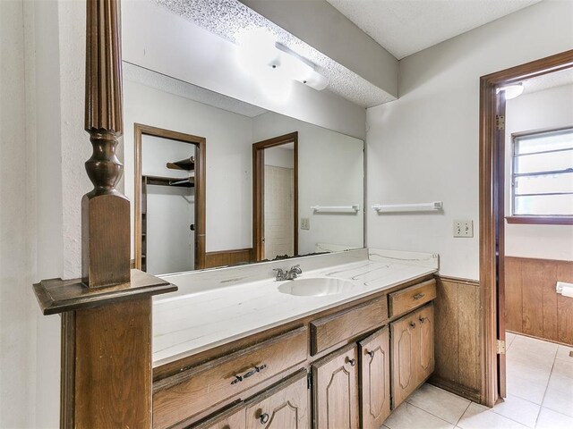 5201 SE 53rd St, Oklahoma City, OK 73135 - bathroom featuring vanity, a wainscoted wall, and tile patterned floors