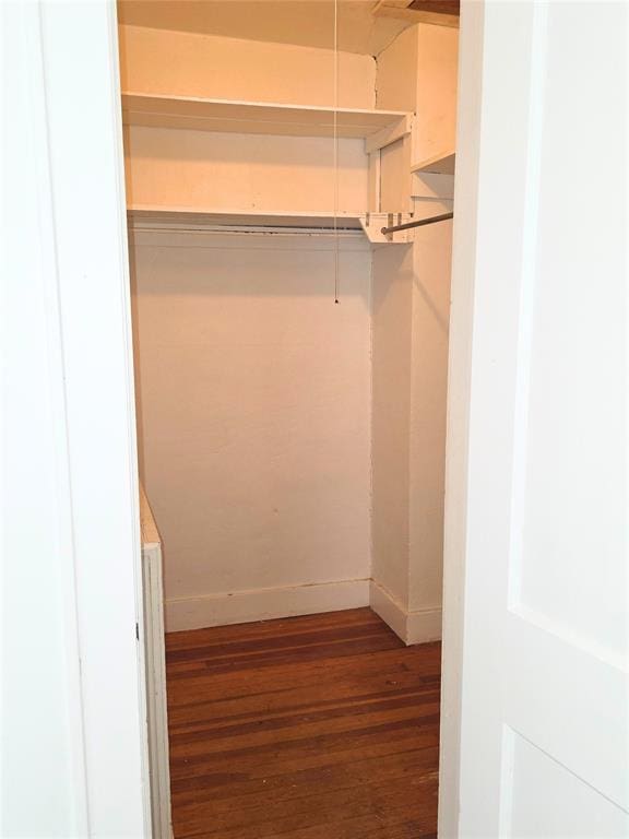 926 S 9th St, Chickasha, OK 73018 - spacious closet featuring wood finished floors