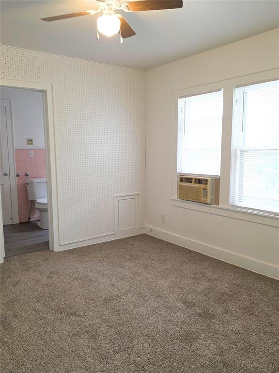 926 S 9th St, Chickasha, OK 73018 - spare room with a ceiling fan, cooling unit, and carpet floors