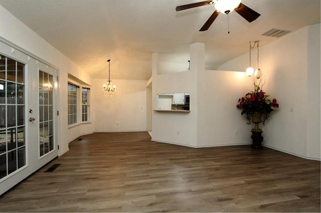 8113 Turtle Dove Dr, Oklahoma City, OK 73132 - unfurnished living room with wood finished floors, french doors, a chandelier, lofted ceiling, and a ceiling fan