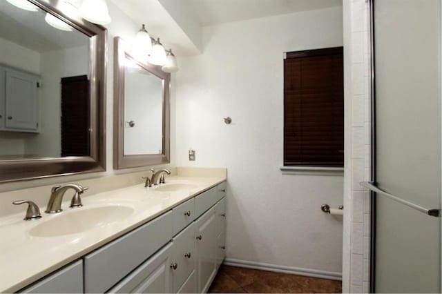 8113 Turtle Dove Dr, Oklahoma City, OK 73132 - full bath with double vanity, tile patterned flooring, and a shower with door