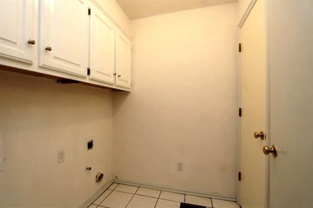 8113 Turtle Dove Dr, Oklahoma City, OK 73132 - washroom with hookup for an electric dryer, cabinet space, and light tile patterned floors