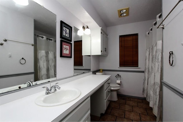 8113 Turtle Dove Dr, Oklahoma City, OK 73132 - bathroom with vanity and toilet