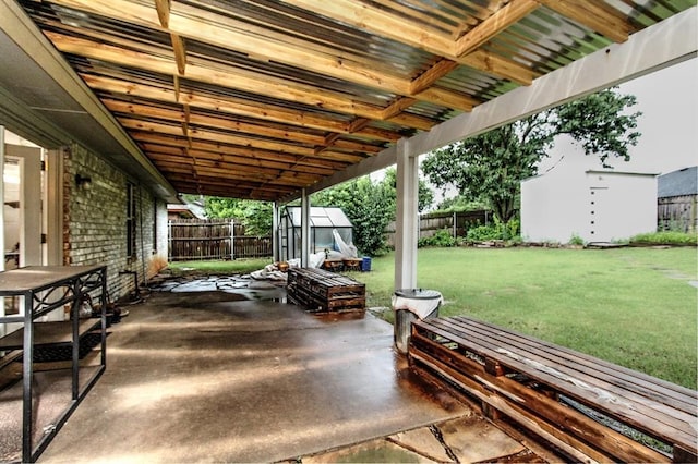 8113 Turtle Dove Dr, Oklahoma City, OK 73132 - fenced backyard with a storage shed and a patio