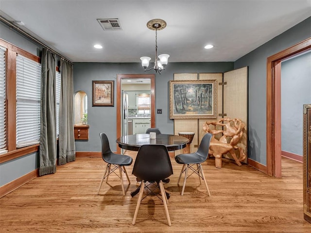 1616 NW 41st St, Oklahoma City, OK 73118 - dining space featuring baseboards, light wood-type flooring, a chandelier, and recessed lighting