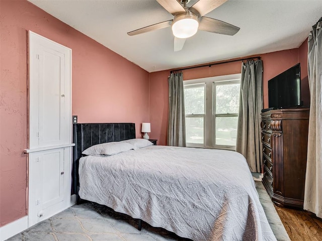 1616 NW 41st St, Oklahoma City, OK 73118 - bedroom with a ceiling fan and wood finished floors