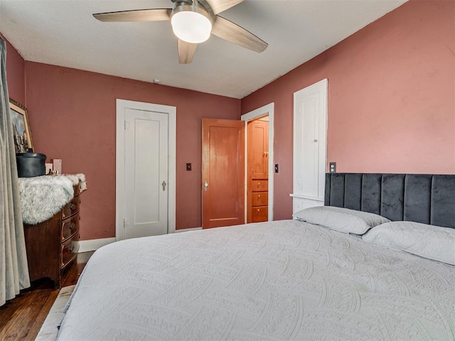 1616 NW 41st St, Oklahoma City, OK 73118 - bedroom featuring dark wood-type flooring, ceiling fan, and baseboards
