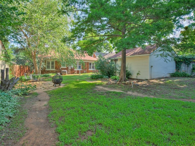 1616 NW 41st St, Oklahoma City, OK 73118 - view of yard featuring an outdoor fire pit