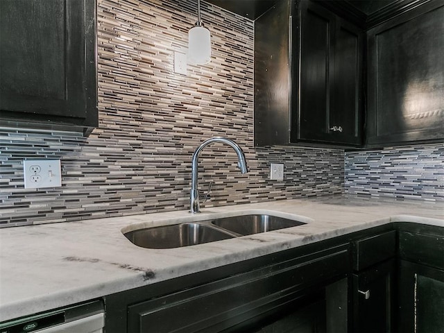 1117 Washington St, Edmond, OK 73034 - kitchen with backsplash, dishwasher, and dark cabinets