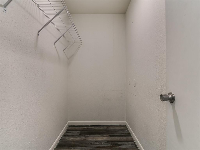 1117 Washington St, Edmond, OK 73034 - spacious closet featuring wood finished floors