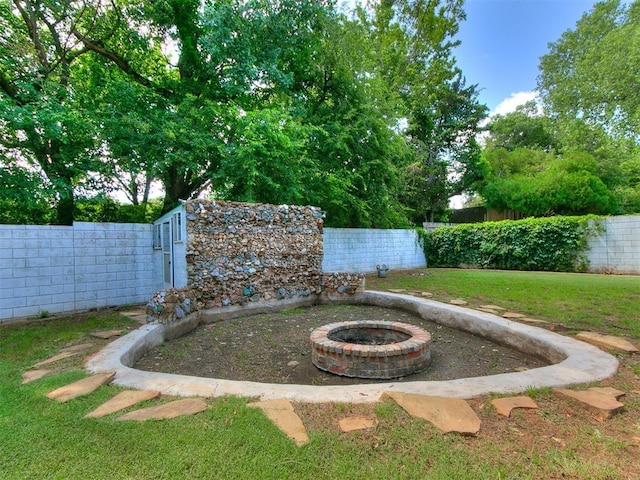 1117 Washington St, Edmond, OK 73034 - view of yard with a fire pit