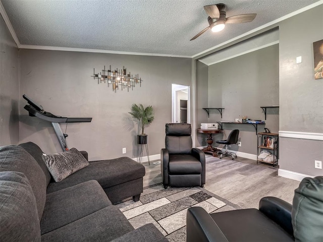3 Antler Blvd, Mcloud, OK 74851 - living area with crown molding, a textured ceiling, wood finished floors, a ceiling fan, and vaulted ceiling