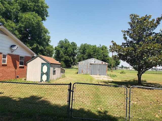 214 N Pecan St, Crescent, OK 73028 - view of yard with a gate and a storage shed