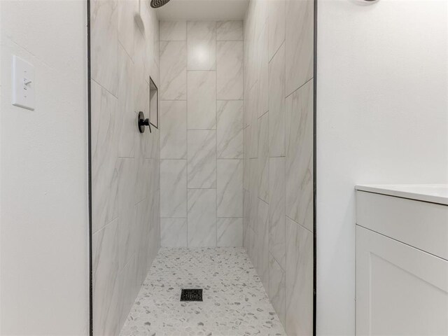 7017 S Miller Ave, Oklahoma City, OK 73159 - full bathroom featuring a tile shower and vanity