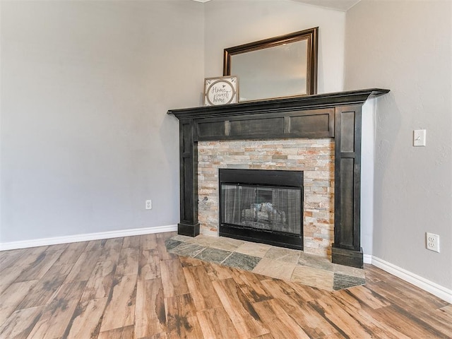 2517 NW 194th St, Edmond, OK 73012 - detailed view of wood finished floors and a fireplace