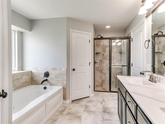 2517 NW 194th St, Edmond, OK 73012 - bathroom featuring a jetted tub, a shower stall, and vanity