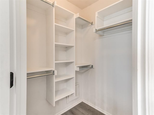 2517 NW 194th St, Edmond, OK 73012 - walk in closet featuring dark wood finished floors