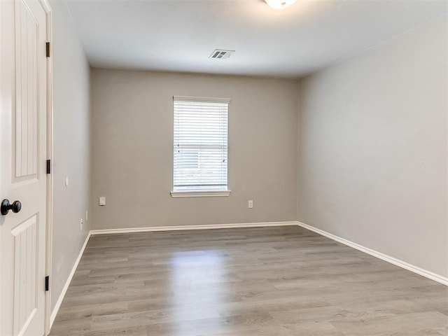 2517 NW 194th St, Edmond, OK 73012 - empty room featuring light wood-style floors and baseboards