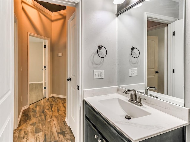 2517 NW 194th St, Edmond, OK 73012 - bathroom featuring vanity and wood finished floors