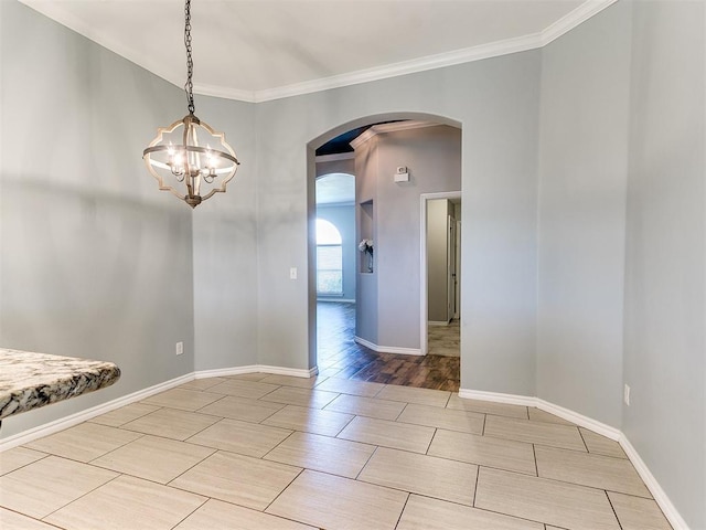 2517 NW 194th St, Edmond, OK 73012 - empty room with arched walkways, crown molding, and a chandelier