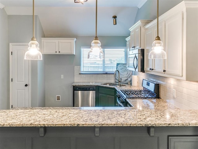 2517 NW 194th St, Edmond, OK 73012 - kitchen featuring stainless steel appliances, light stone countertops, and decorative backsplash