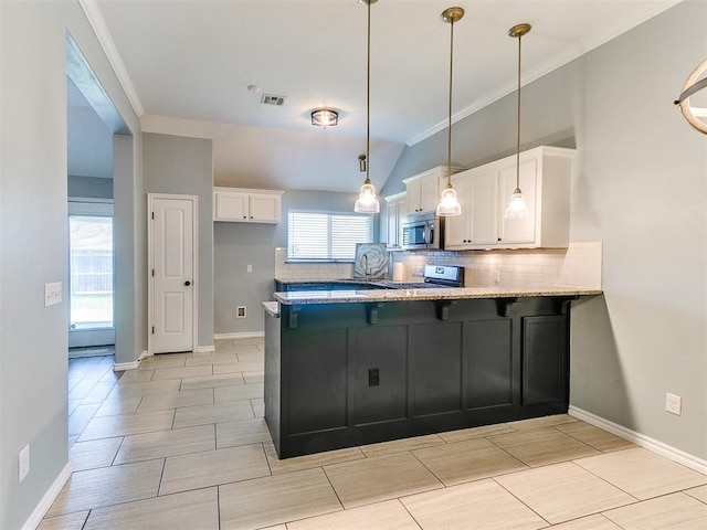 2517 NW 194th St, Edmond, OK 73012 - kitchen with stainless steel appliances, a peninsula, white cabinets, tasteful backsplash, and light stone countertops