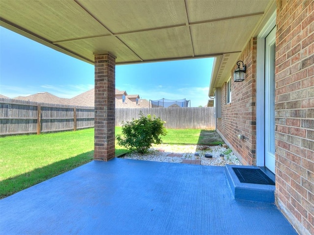 2517 NW 194th St, Edmond, OK 73012 - fenced backyard featuring a patio area