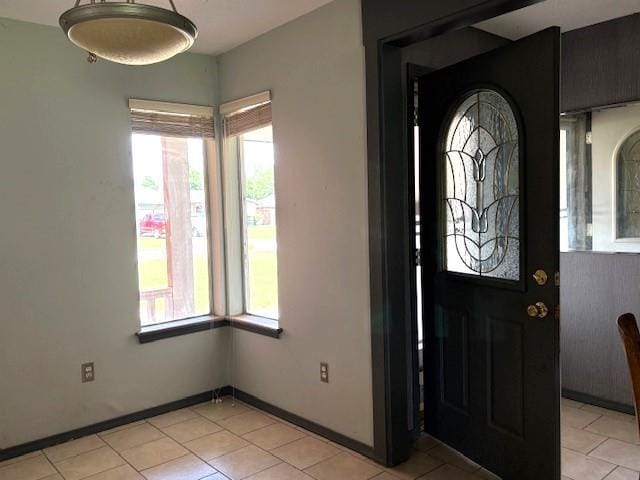 5720 Rushing Rd, Oklahoma City, OK 73132 - entrance foyer featuring plenty of natural light and light tile patterned floors