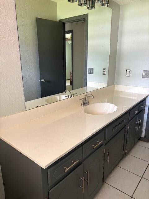 5720 Rushing Rd, Oklahoma City, OK 73132 - bathroom with vanity and tile patterned flooring
