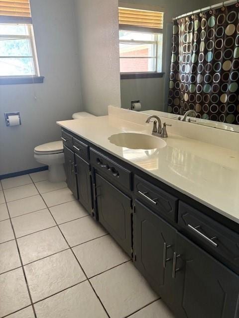 5720 Rushing Rd, Oklahoma City, OK 73132 - bathroom with tile patterned flooring, vanity, plenty of natural light, and a shower with shower curtain