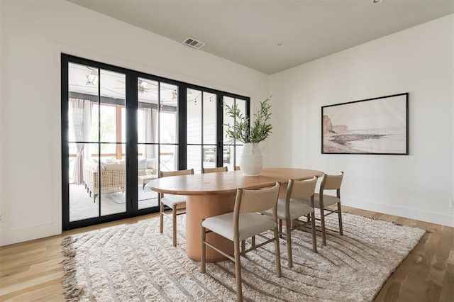 1700 Runway Blvd, Oklahoma City, OK 73108 - dining room featuring plenty of natural light and light wood-style flooring