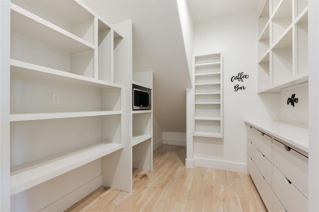 1700 Runway Blvd, Oklahoma City, OK 73108 - spacious closet featuring light wood-type flooring