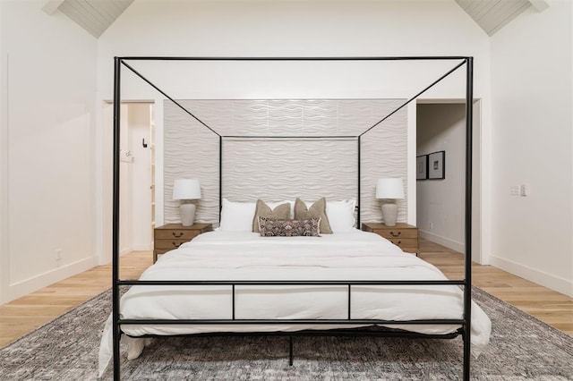 1700 Runway Blvd, Oklahoma City, OK 73108 - bedroom with light wood-type flooring and vaulted ceiling