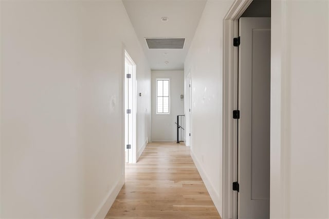 1700 Runway Blvd, Oklahoma City, OK 73108 - hallway featuring light wood-type flooring and baseboards