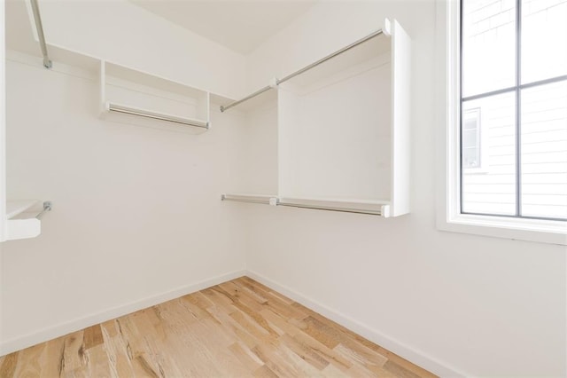 1700 Runway Blvd, Oklahoma City, OK 73108 - walk in closet featuring wood finished floors
