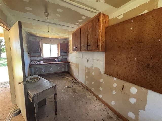 5311 S Cason Rd, Marlow, OK 73055 - kitchen with brown cabinetry