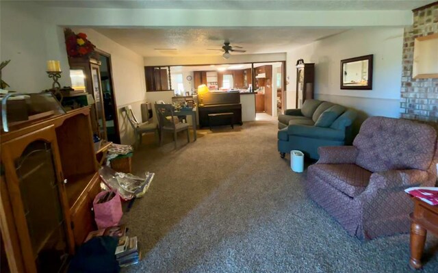 5311 S Cason Rd, Marlow, OK 73055 - carpeted living room featuring ceiling fan