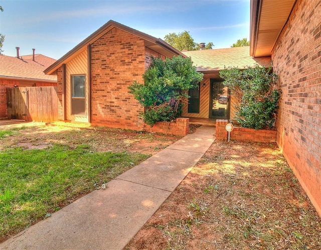 1405 Creston Way, Edmond, OK 73012 - property entrance featuring brick siding