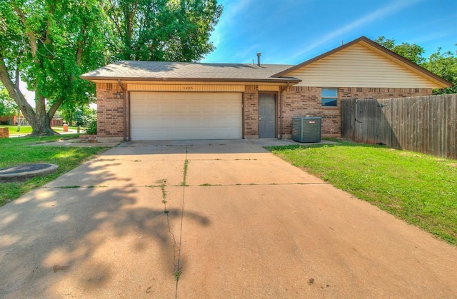 1405 Creston Way, Edmond, OK 73012 - view of front facade with concrete driveway, brick siding, and an attached garage