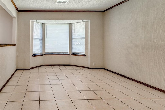 1405 Creston Way, Edmond, OK 73012 - spare room with crown molding, a textured ceiling, and light tile patterned floors