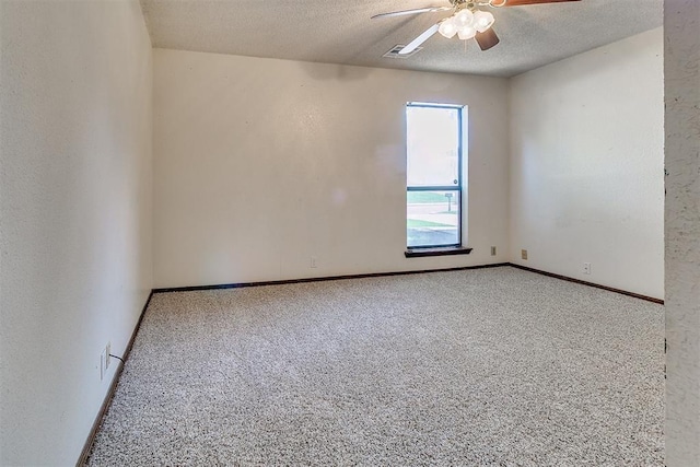 1405 Creston Way, Edmond, OK 73012 - empty room featuring ceiling fan, a textured ceiling, and carpet