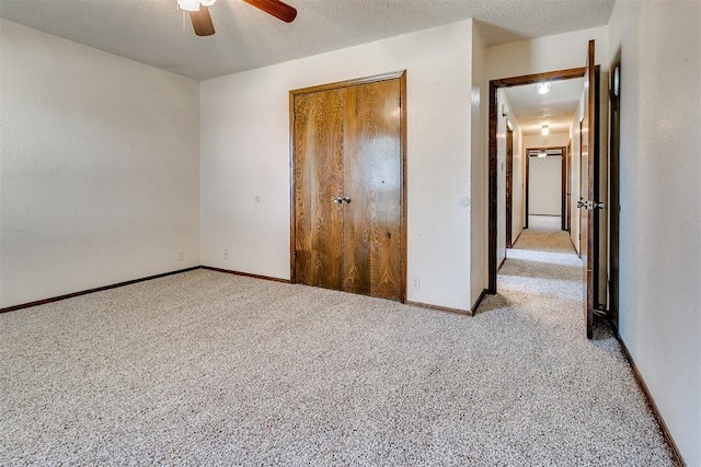 1405 Creston Way, Edmond, OK 73012 - unfurnished bedroom with carpet floors, a closet, and ceiling fan