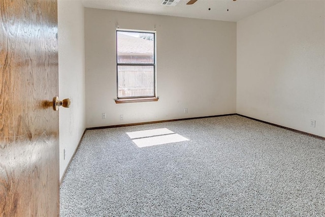 1405 Creston Way, Edmond, OK 73012 - empty room featuring carpet and ceiling fan