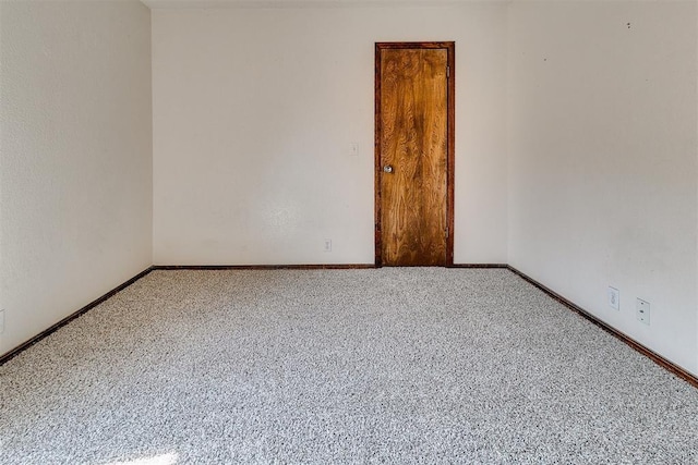 1405 Creston Way, Edmond, OK 73012 - carpeted spare room featuring baseboards