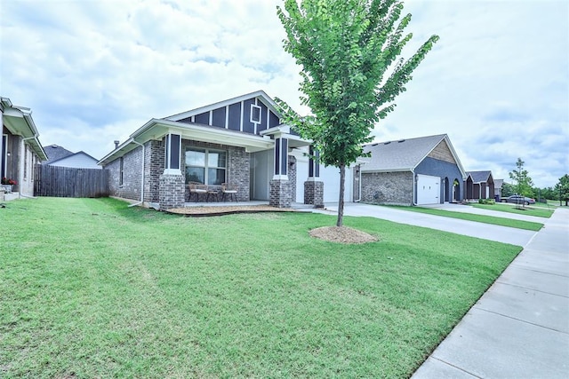 16336 Coldfire Rd, Oklahoma City, OK 73170 - view of front of property with driveway, brick siding, and a garage