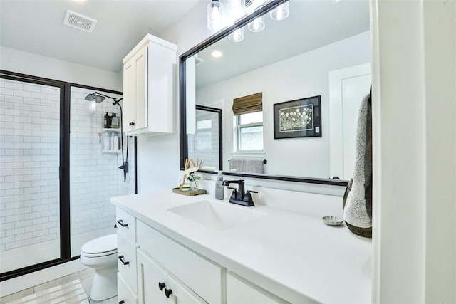 16336 Coldfire Rd, Oklahoma City, OK 73170 - bathroom featuring a shower stall, vanity, and recessed lighting