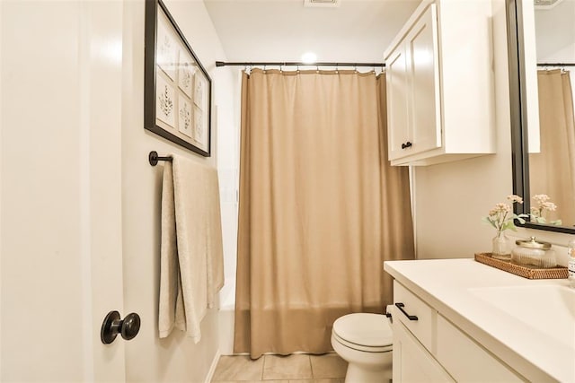 16336 Coldfire Rd, Oklahoma City, OK 73170 - bathroom featuring vanity, tile patterned floors, and shower / bath combo with shower curtain